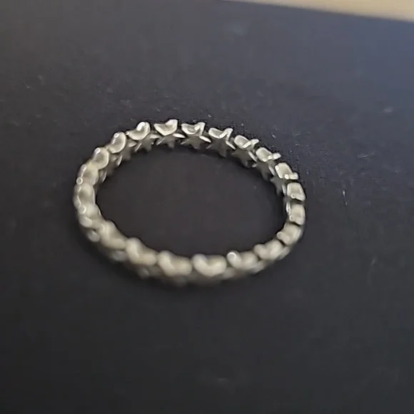 Sterling silver ring with stars all the way around the band. Infinity star band - Picture 3 of 4